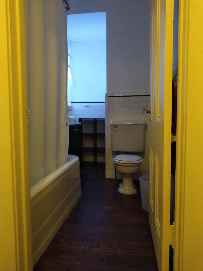 Mini Mansion Near Public Transportation Is The Yellow And House On The Corner Of 8th St And Madison Avenue Homestay